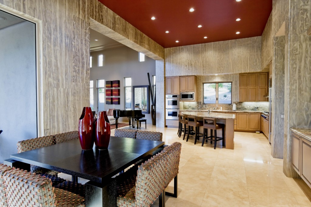 Dining area with view of kitchen and living room in the background