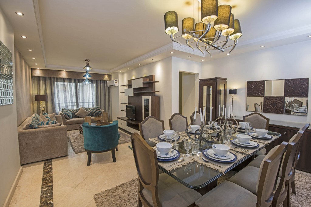 Interior design of a luxury apartment show home living area and lounge with dining table